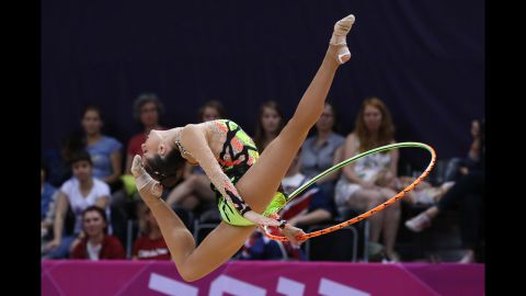 Spain's Carolina Rodriguez performs her hoop routine during the individual all-around qualifications of the rhythmic gymnastics.