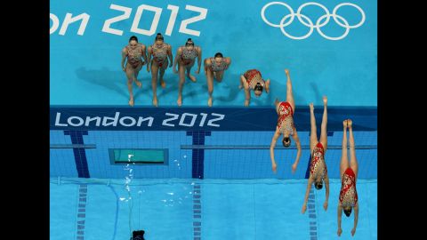 Russia performs a women's teams synchronized swimming technical routine.