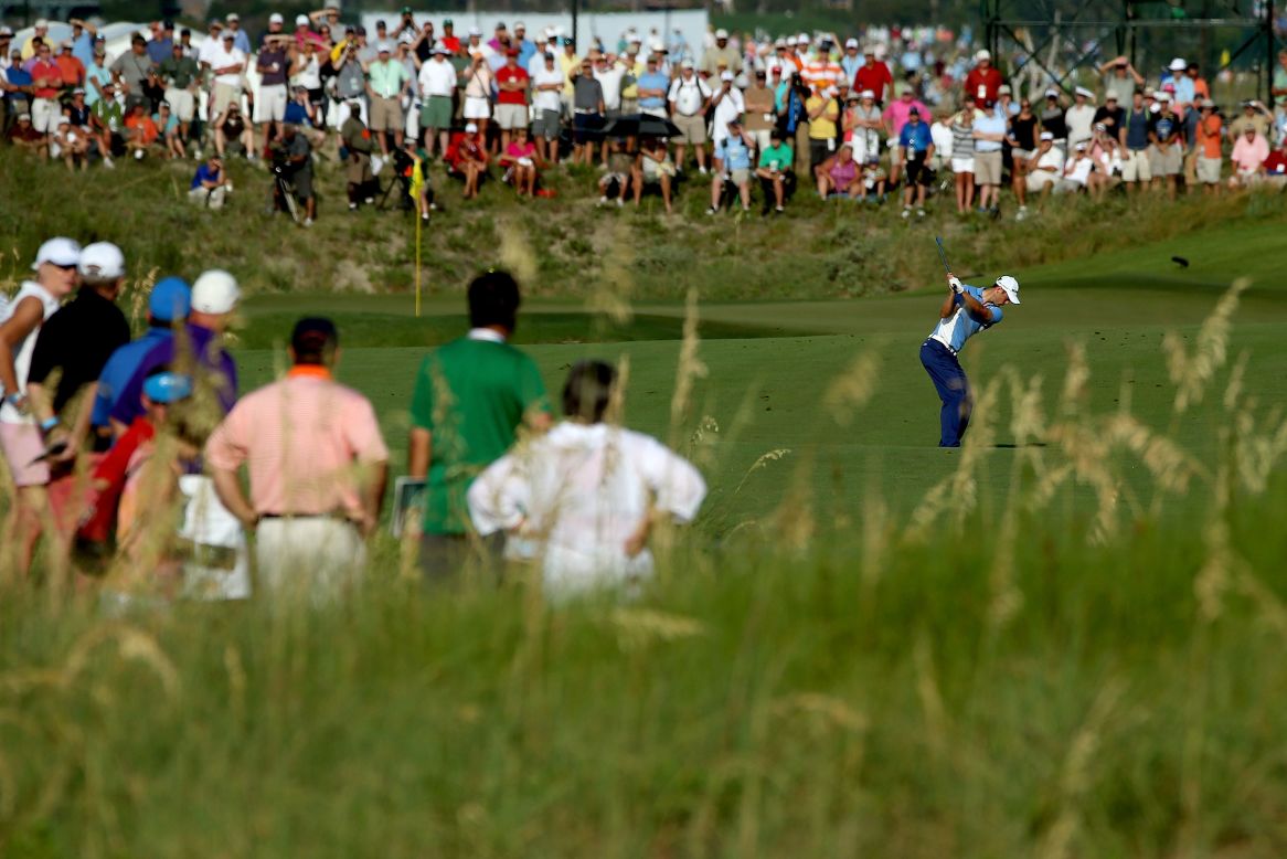 Martin Kaymer of Germany hits a shot from the 10th fairway on Thursday.