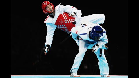 Martin Stamper of Great Britain competes against Servet Tazegul of Turkey during the men's 68-kilogram taekwondo semifinal match.