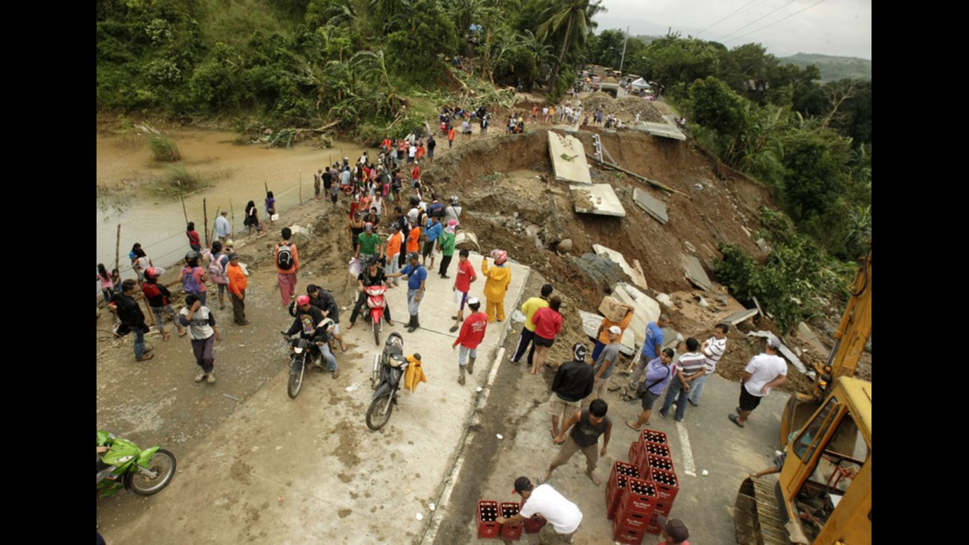 A road was wiped out by flash flooding in Antipolo City, east of Manila.