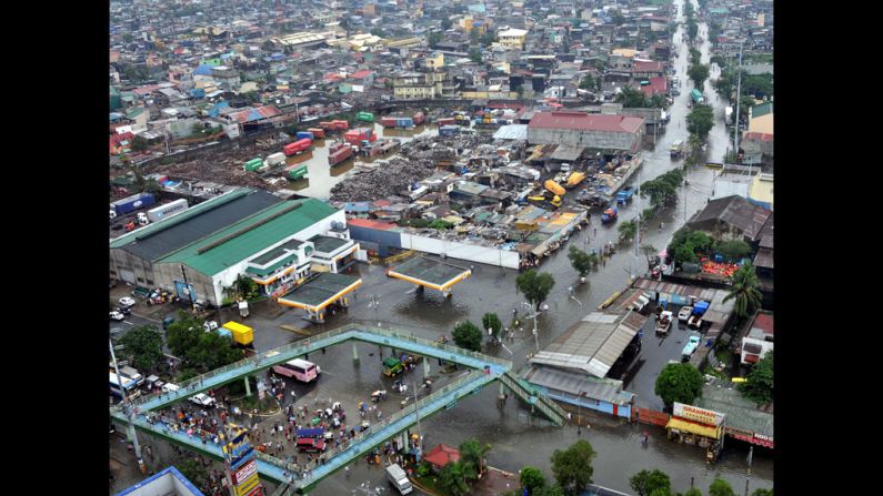 A Department of National Defense aerial photograph shows floodwaters in Navotas city, north of Manila, on Wednesday, August 8.