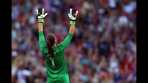 Goalkeeper Hope Solo of the United States reacts after Carli Lloyd scored a goal in the first half.