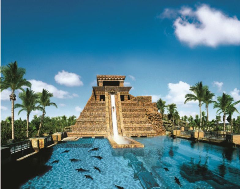 The Leap of Faith, a 60-foot-tall, nearly perpendicular slide, cascades down a life-size replica of a Mayan temple.