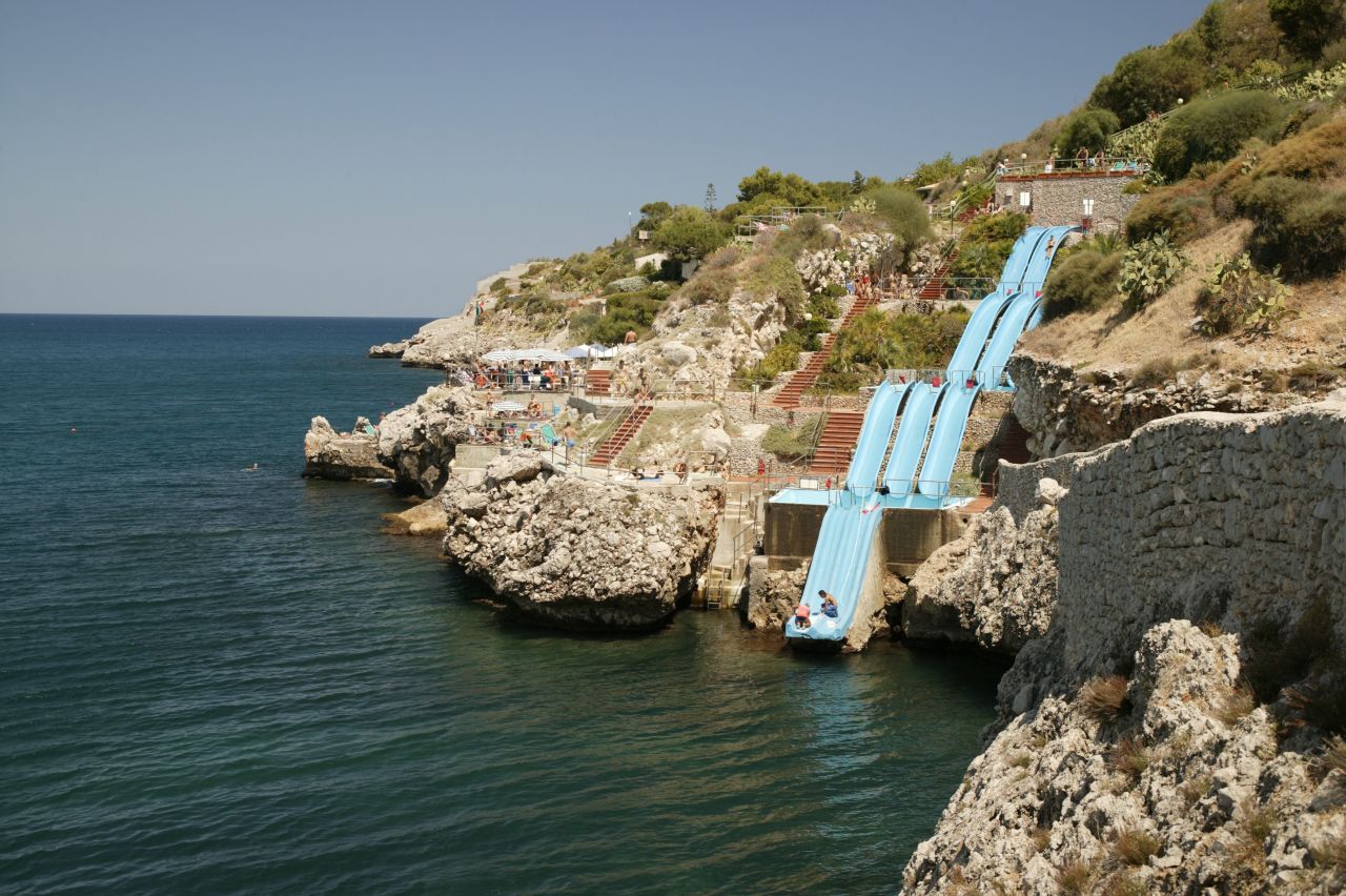 Eleven slides form Sicily's most scenic water attraction, the Toboggan, which runs down a cliff on the northwest coast of the island.