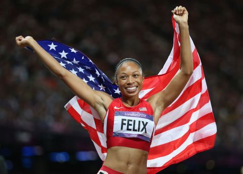  U.S. athlete Allyson Felix celebrates after winning gold in the women's 200m final on Day 12 of the London Games at the Olympic Stadium.