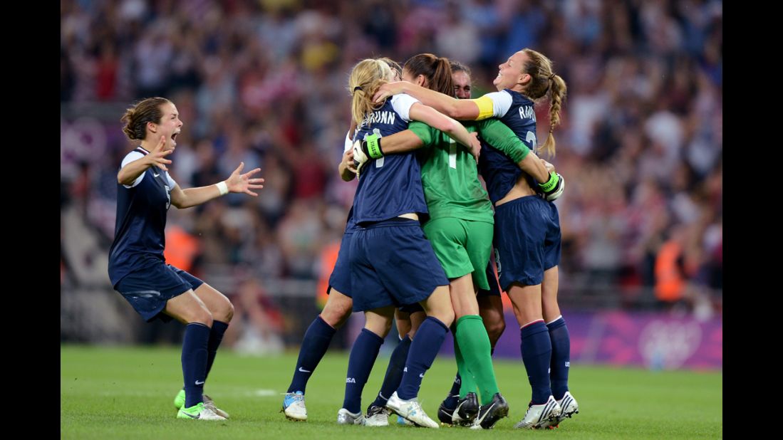 The United States women's soccer team begins the celebration after defeating Japan, avenging its 2011 World Cup final loss.