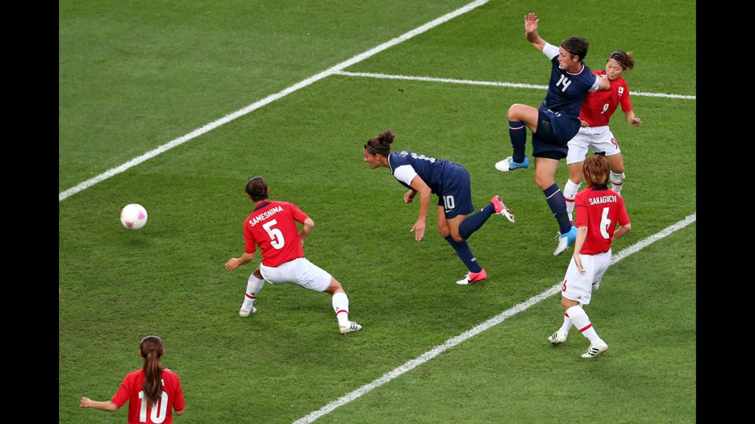 Midfielder Carli Lloyd of the United States heads in a goal in the first half of the game against Japan. The U.S. women's soccer team took its third straight Olympic gold medal.