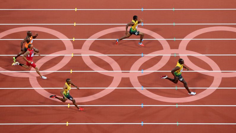 Usain Bolt of Jamaica leads Yohan Blake of Jamaica during the men's 200-meter final.