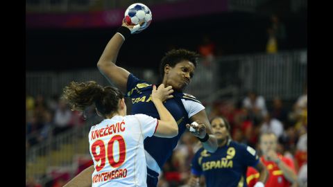 Spain's leftback Nely Alberto Francisca vies with a competitor during the women's semifinal handball match between Spain and Montenegro.