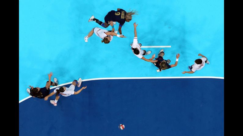 Marta Mangue Gonzalez of Spain scores a goal during the women's handball semifinal with Montenegro.