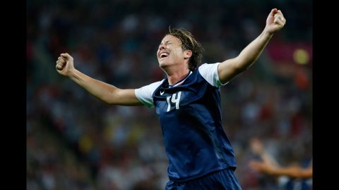 No. 14 Abby Wambach of United States reacts after a goal by No. 10 Carli Lloyd in the second half against Japan during the women's soccer gold medal match.