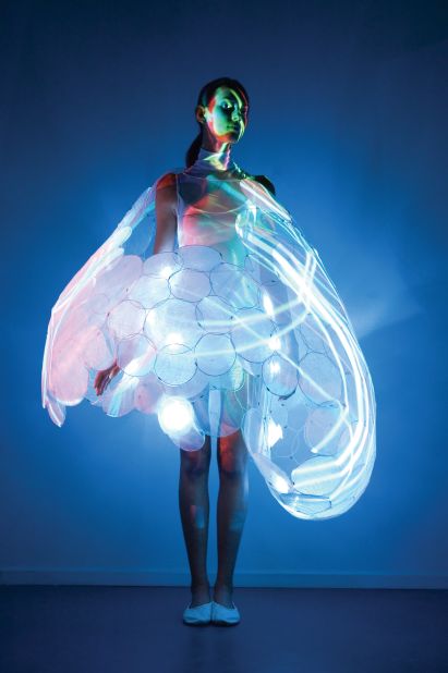 The Bubelle dress, designed for electronics firm Philips, conveys the emotional state of the person wearing the garment through miniature projectors located between the layers of the dress. A series of sensors collect data such as heart rate and respiration, which is visualized by altering the intensity, shape and colors of light generated by the projectors.  