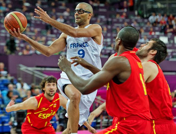 France's NBA star Tony Parker was powerless to stop Spain's march into the semifinal of the men's basketball -- the final score 66-59.