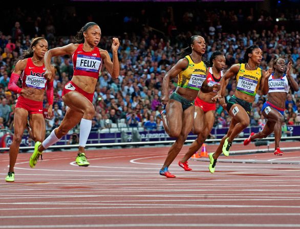 Allyson Felix defeats a truly world-class field to take women's 200m gold. Shelly-Ann Fraser-Pryce of Jamaica, the 100m champion, was a close second with American Carmelita Jeter third.