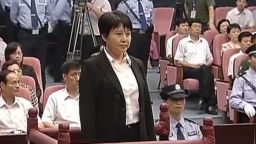 This frame grab taken from CCTV video shows Gu Kailai (C), the wife of disgraced Chinese politician Bo Xilai, facing the court during her murder trial in Hefei on August 9, 2012. Gu went on trial on August 9 accused of murdering British businessman Neil Heywood in a case that has rocked the Communist party as it gears up for a leadership change.