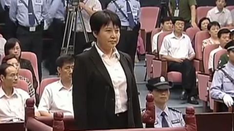 Image from CCTV video shows Gu Kailai (C) facing the court during her murder trial in Hefei on August 9, 2012.