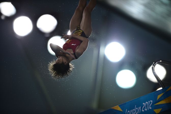 China's Hu Yadan competes in the women's 10-meter platform semifinals.
