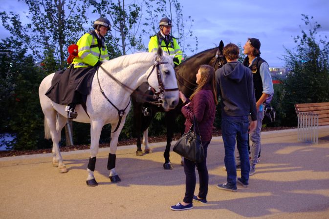 In the absence of large crowds, mounted police officers had time to chat to spectators - who took the opportunity to admire their horses, too.