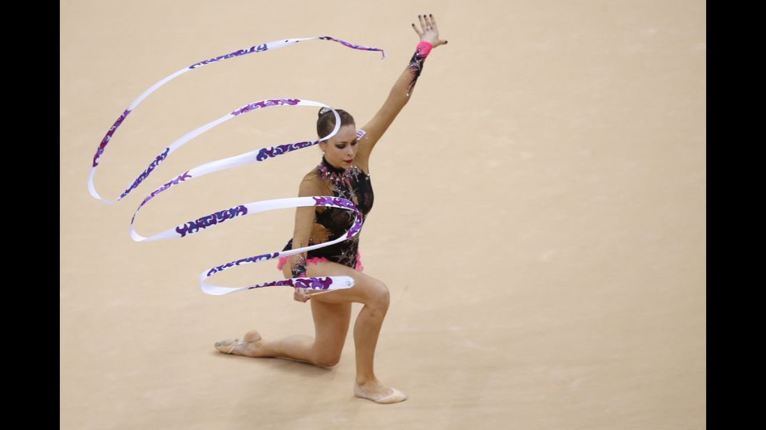Britain's Francesca Jones performs her ribbon program during the individual all-around qualifications of the rhythmic gymnastics event.