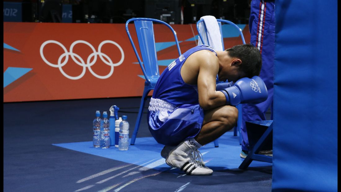 Thailand's Kaeo Pongprayoon has a quiet moment before entering the ring in the men's light flyweight (48-kilogram) boxing semifinals.