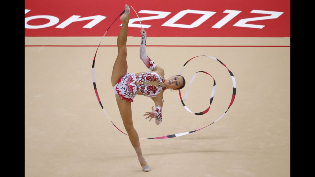 Bulgaria's Silviya Miteva performs her ribbon program during the individual all-around qualifications of the rhythmic gymnastics event.
