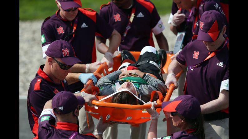 Brazi's Squel Stein is carried off in a stretcher after crashing in the women's BMX cycling semifinals.