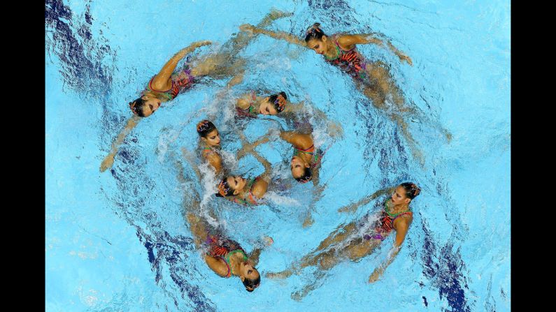 Egypt competes in the women's team synchronized swimming free routine final.