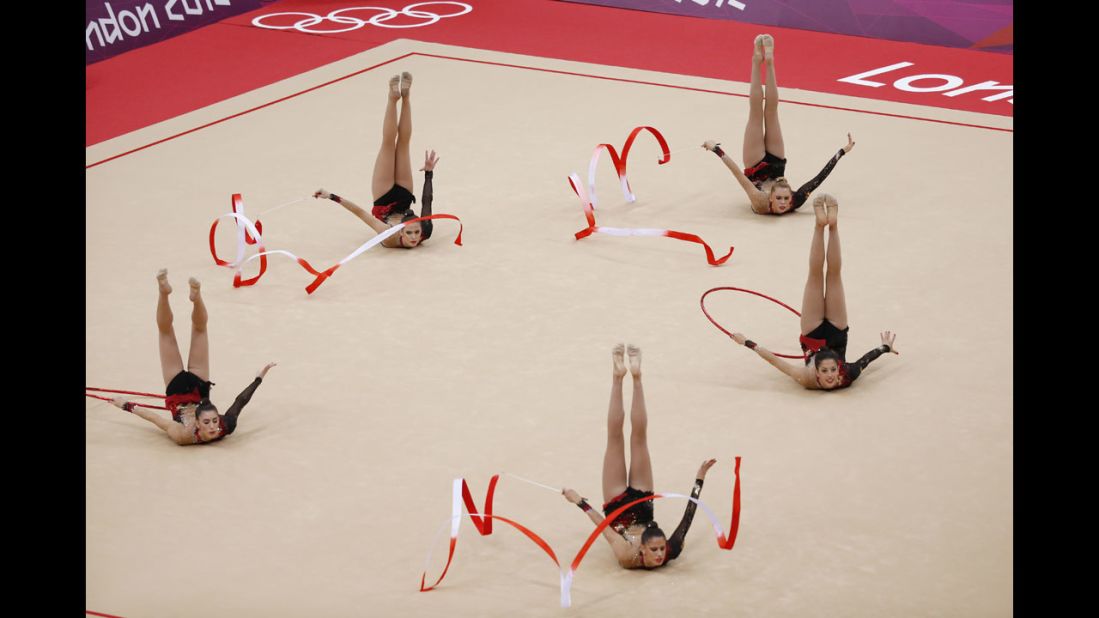 Spain's rhythmic gymnastics team performs in the group all-around qualifications.