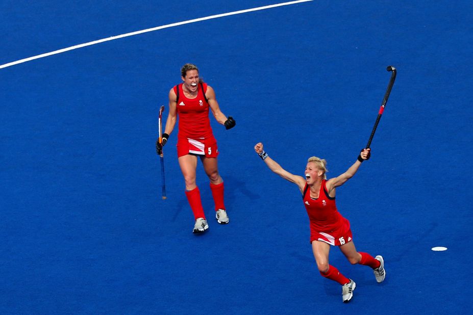 Alex Danson, right, and Crista Cullen of Great Britain react during their women's hockey bronze medal match against New Zealand.