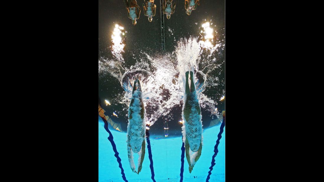 Spain competes in the women's team synchronized swimming free routine final.