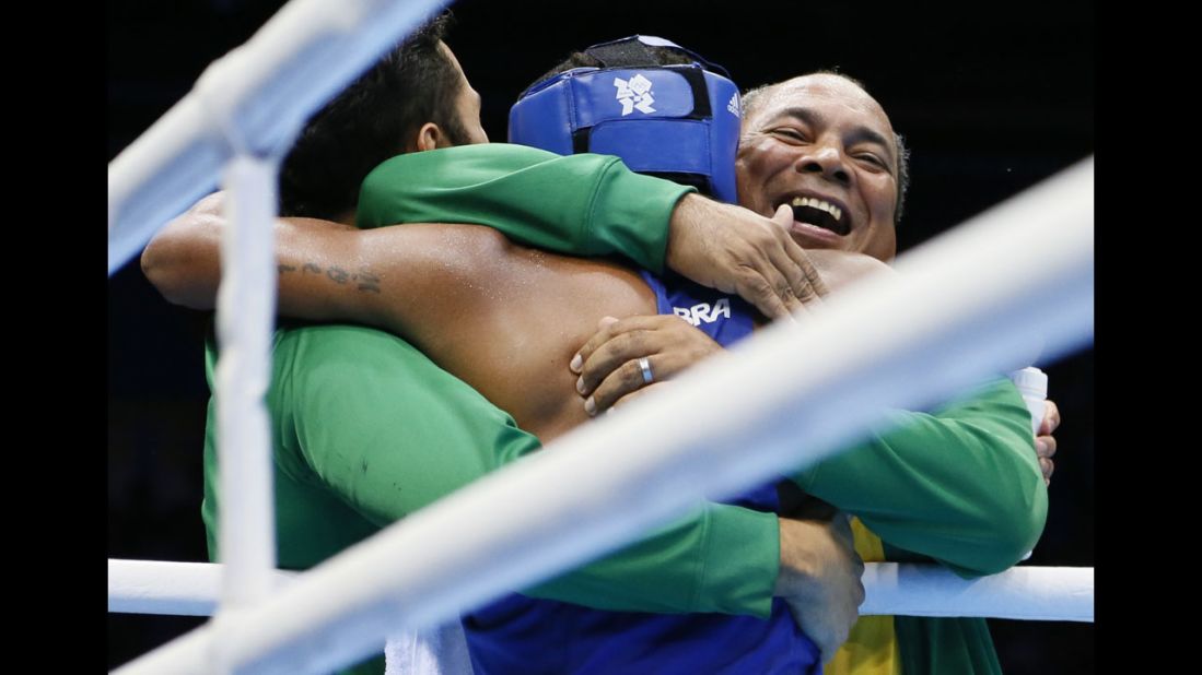 Brazil's Esquiva Falcao Florentino is greeted by his corner after his match against Great Britain's Anthony Ogogo in the men's middleweight boxing semifinals.