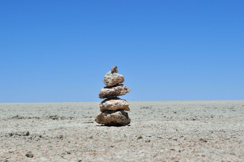 <a href="http://ireport.cnn.com/docs/DOC-825888">Sarah Reese</a> snapped this shot of a stack of rocks while lying down in the salty dirt of the Etosha Pan, a flat saline desert in the middle of Namibia's Etosha National Park. "There are no other rocks near this small stack. It was really odd to see them in this otherwise empty space," she says. The rocks are a cairn, or a stack of stones used as a marker.