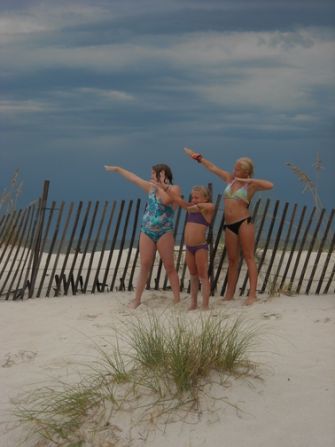 While on vacation to Gulf Shores, AL, Amanda Davis says she asked her daughters to strike a pose for the camera and they spontaneously did the signature 'Bolt' pose. "Just like planking or Tebowing, it's just plain fun," she says. "My oldest daughter loves track and thinks Usain Bolt is an amazing and talented athlete." 