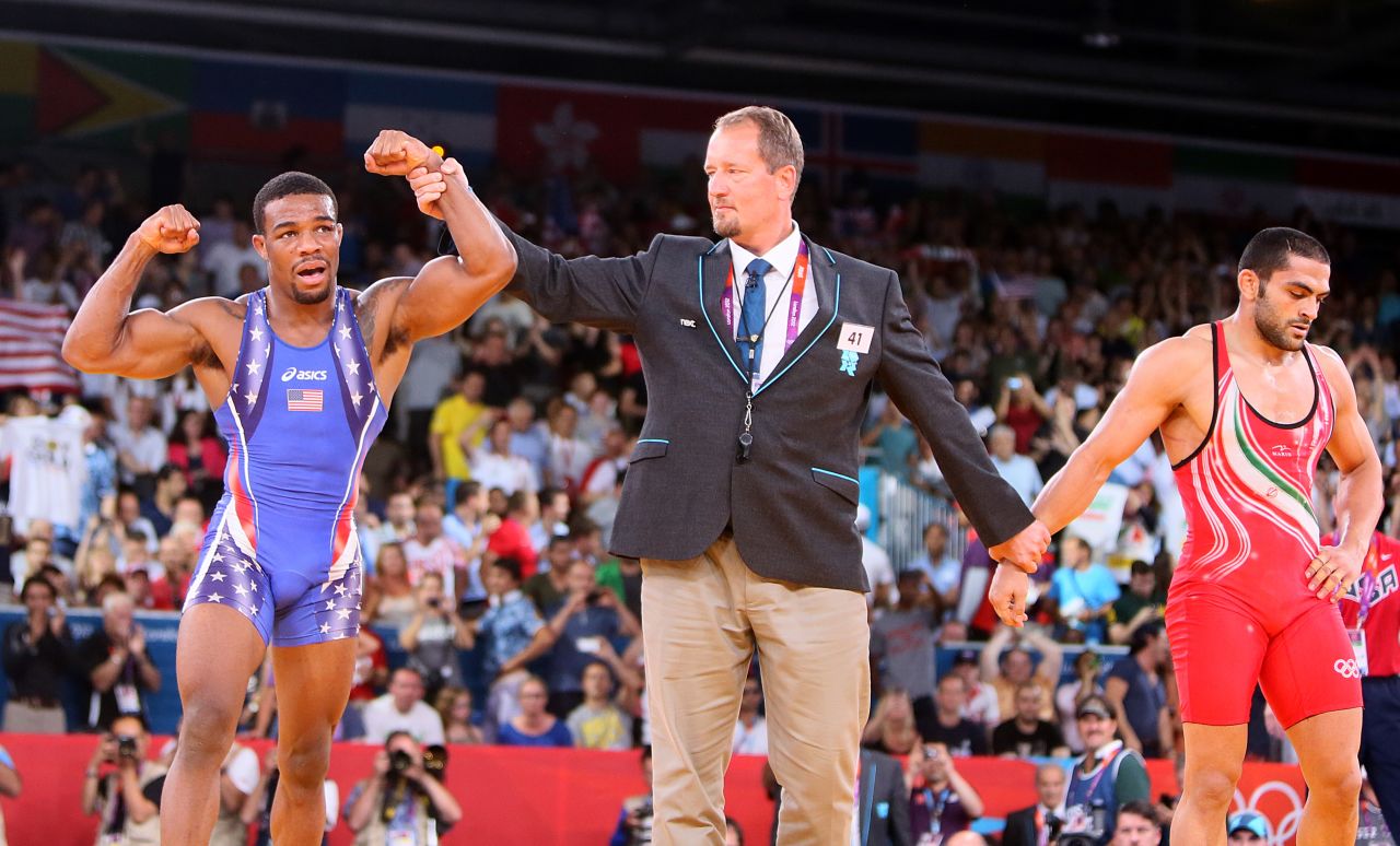Burroughs is declared the winner after defeating Goudarzi.