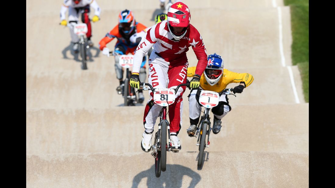 Maris Strombergs of Latvia leads the field in the men's BMX cycling final.