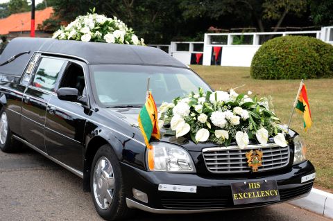 A hearse carries the body of Mills Wednesday to Accra's parliament. The late president was a former law professor and a tax expert. He was Ghana's vice president from 1997 to 2000.