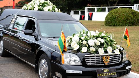 A hearse carries the body of late Ghanaian president John Atta Mills to the parliament in Accra on Wednesday.