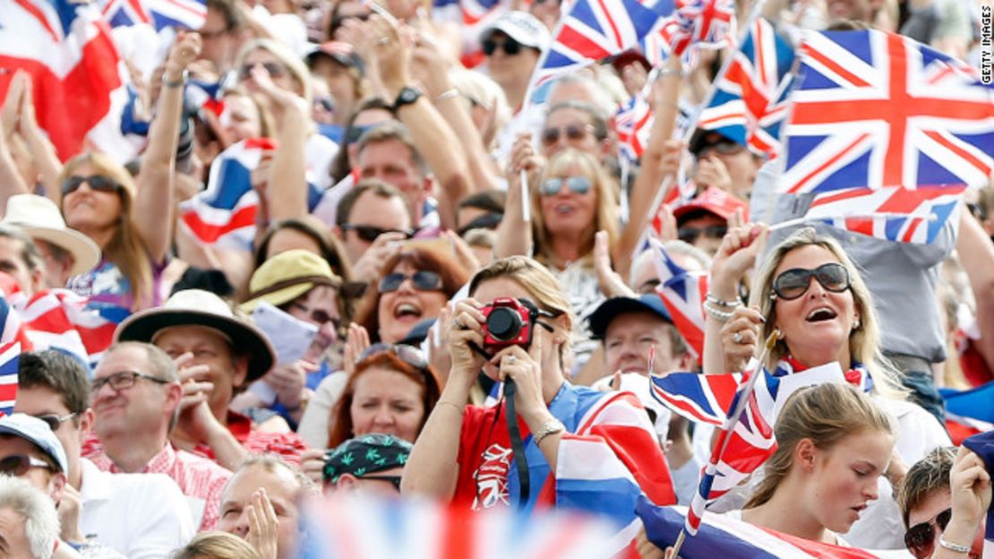 Fans of the home side, Team GB, wave Union Jack flags during the Olympic Games - (GETTY IMAGES)