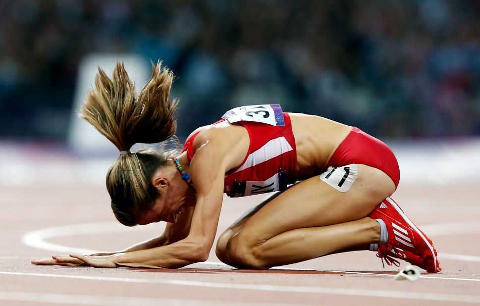 Morgan Uceny of the United States reacts after falling during the women's 1500-meter final.