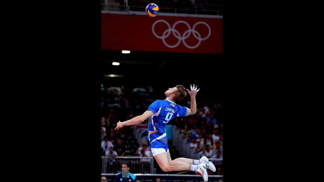 Ivan Zaytsev, No.9 of Italy, serves the ball against Brazil during the men's volleyball semifinals.