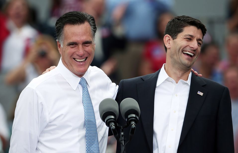 Republican presidential candidate Mitt Romney, left, jokes with Wisconsin Rep. Paul Ryan Saturday, August 11, after announcing him as his running mate at a campaign event on the USS Wisconsin in Norfolk, Virginia.