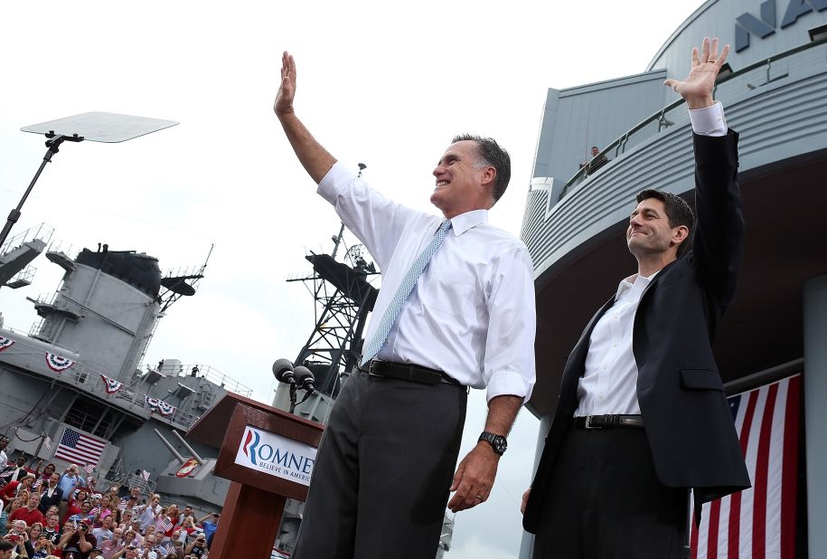 Romney and Ryan wave to supporters.