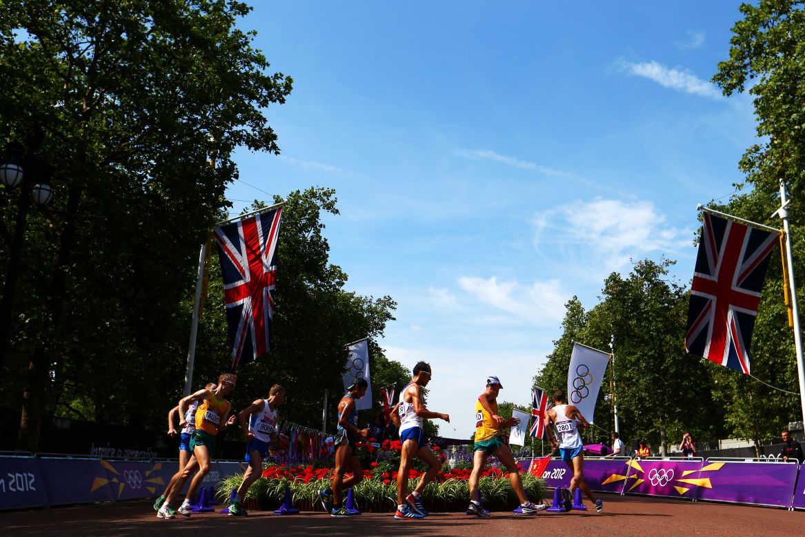 Athletes compete during the men's 50-kilometer walk.