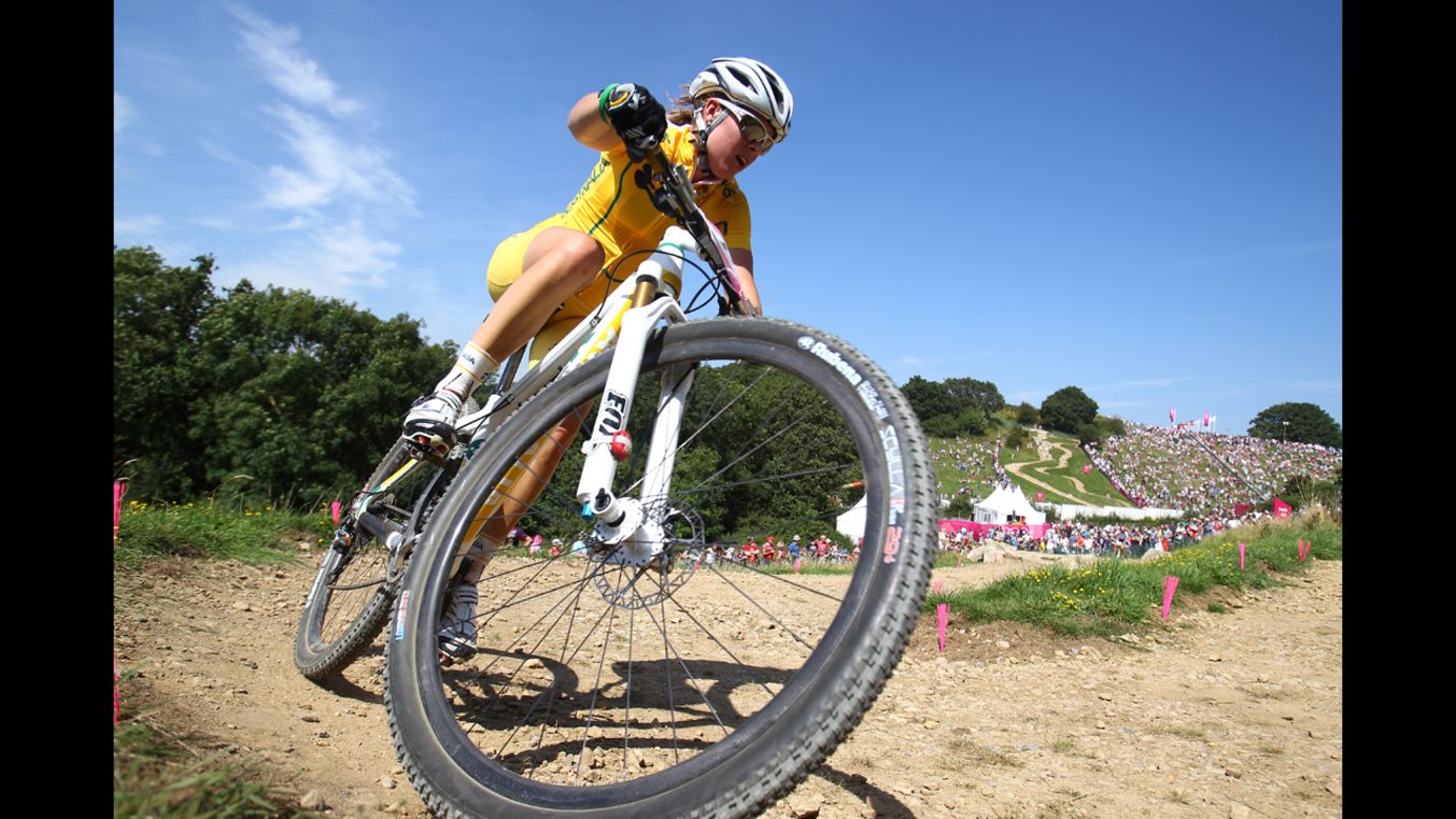 Rebecca Henderson of Australia competes in the women's cross-country mountain bike race.