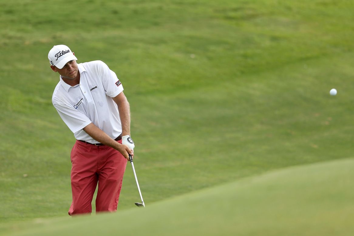 Bill Haas of the United States hits a shot on the seventh hole during round three.