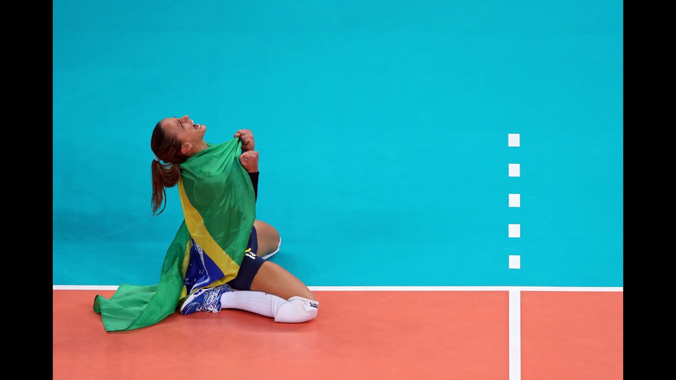 No. 14 Fabiana Oliveira of Brazil reacts after defeating the United States to win the women's volleyball gold medal match.