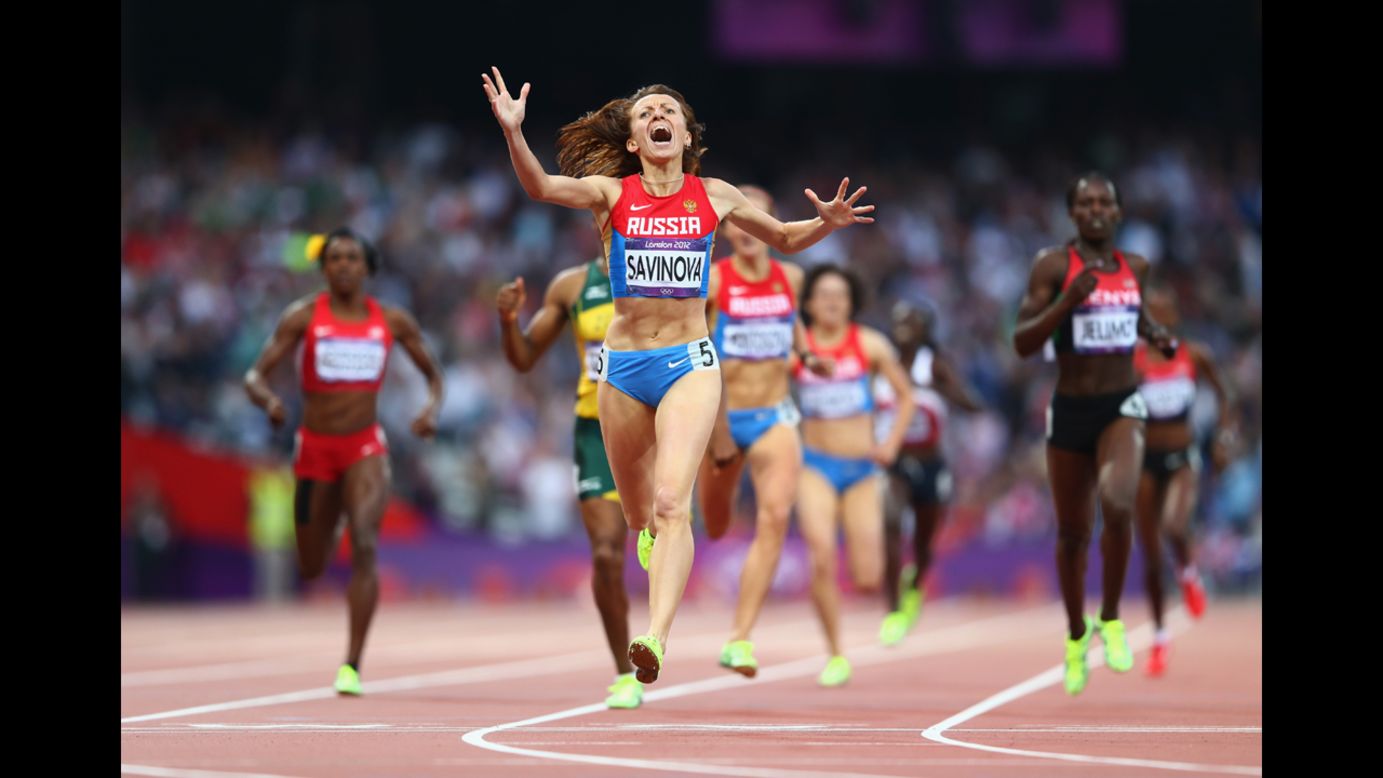 Mariya Savinova of Russia celebrates as she crosses the finish line to win gold in the women's 800-meter final.