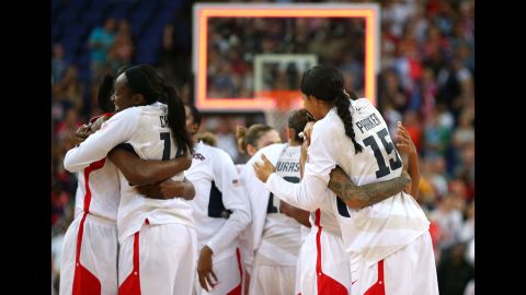 Members of the U.S. women's basketball team celebrate after defeating France in London 2012, to continue a 41-game winning streak stretching back 20 years. 