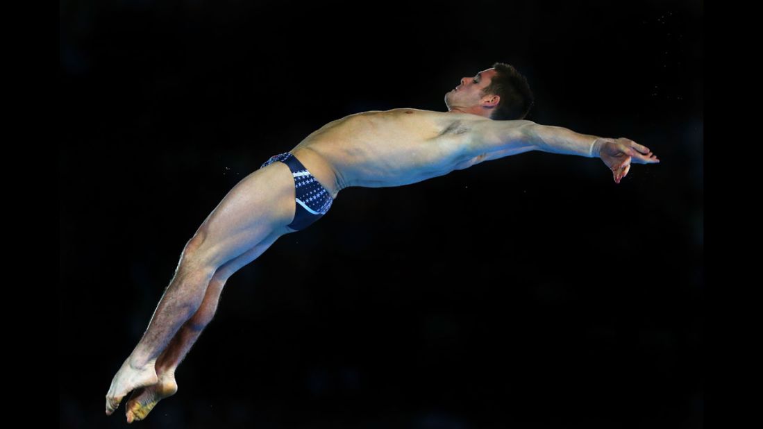 American David Boudia performs a dive in the the men's 10-meter platform diving final. He won gold with China's Bo Qiu taking silver and Great Britain's Tom Daley winning bronze.